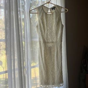 Open back white dress.